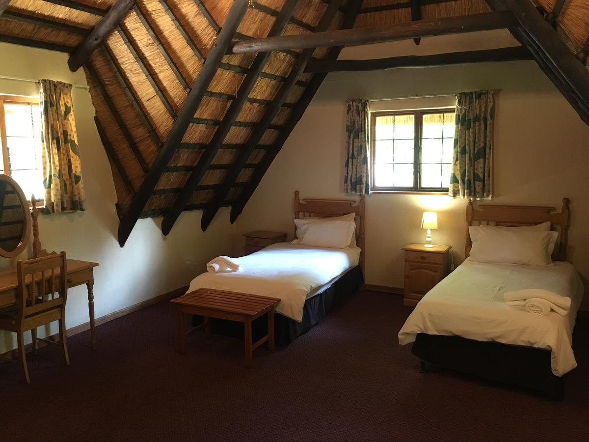 Dragon Peaks Mountain Resort Champagne Valley Exteriör bild