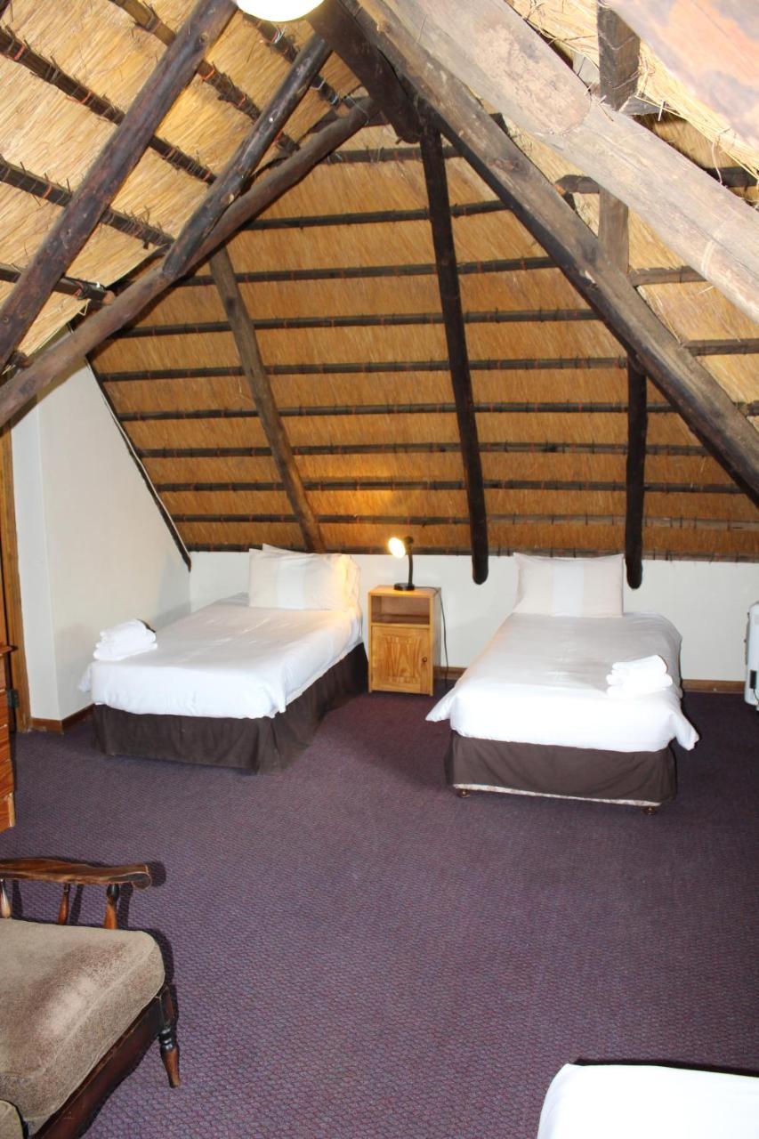 Dragon Peaks Mountain Resort Champagne Valley Exteriör bild